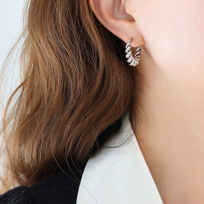Guldøreringe Aurum Twist | 18k Guld - DK BUTIK